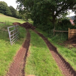 Tracks to field where sub soil will be buried