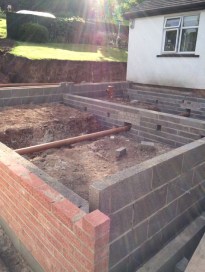 Brick work before block and beam