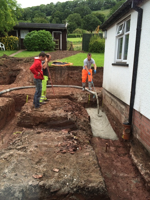 trenches being filled with concrete