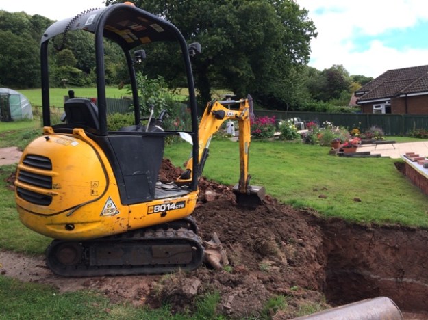 Digger to remove remaining soil for steps 2