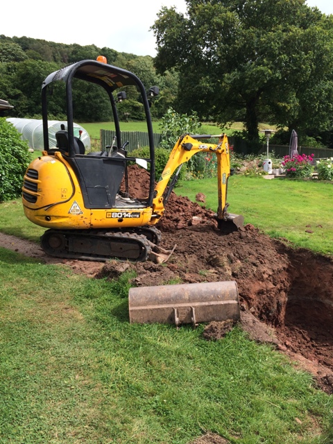 Digger to remove remaining soil for steps