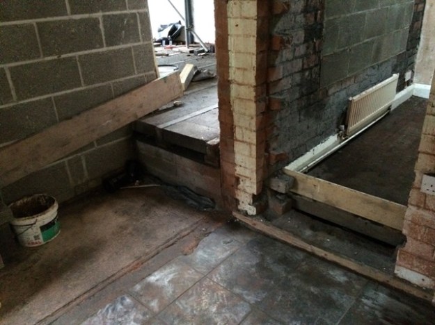 2-doorways-now-opened-up-left-to-kitchen-right-to-new-bathroom-rubble-all-cleared-away