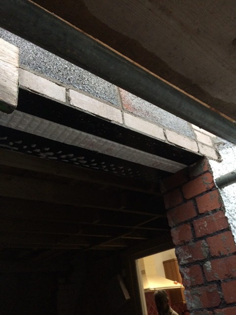 bricks-in-place-over-back-door-outside-doors-and-windows-have-been-measured