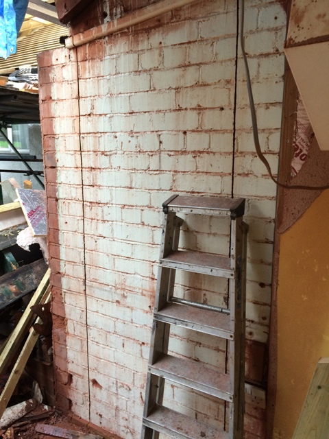 close-up-of-grooves-cut-for-door-to-new-bathroom