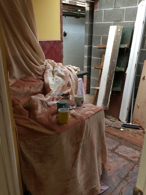everything-covered-to-protect-from-very-fine-red-brick-dust-after-cutting-grooves-for-new-doorway-in-utility-room-2