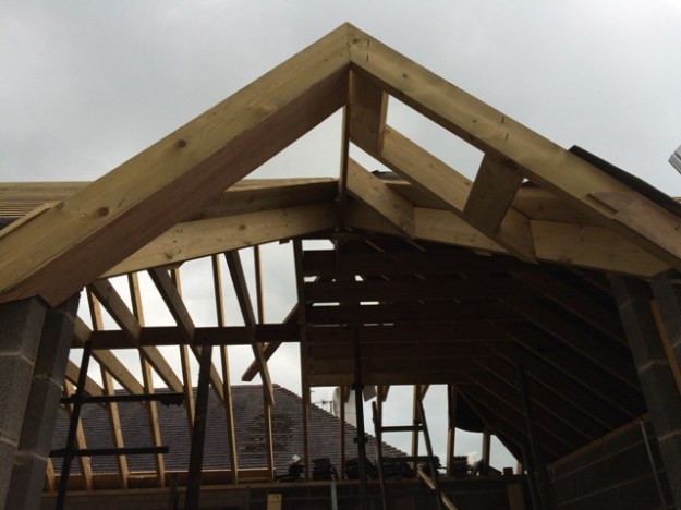 hip-roof-being-reconstructed