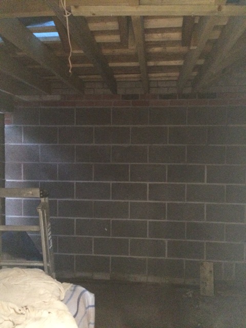 skylight-shown-in-blue-tarpaulin-over-top