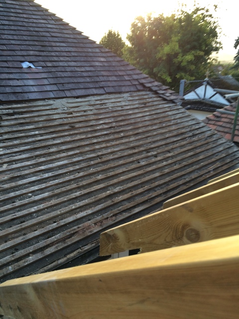 Tiles removed over the utility room, picture taken from scaffolding