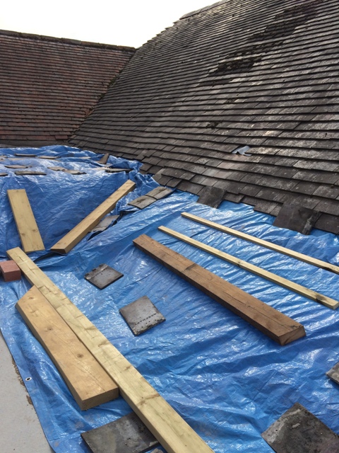 view-from-scaffolding-of-tarpaulins-over-part-of-new-bathroom-and-utility-room