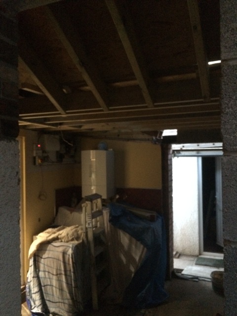 view-into-utility-room-from-new-kitchen-fibre-boards-in-place-on-roof