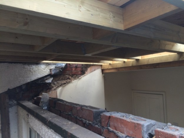 view-of-new-beams-now-in-place-for-new-roof-over-old-small-bedroom-soon-to-be-family-bathroom