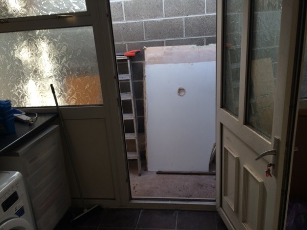 view-through-utility-door-old-ceiling-outside