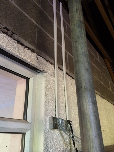 cable-coming-down-for-sky-aerial-and-power-for-tv