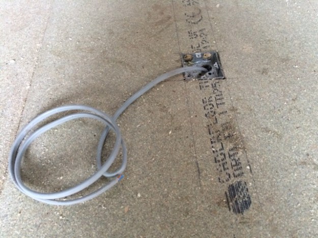 electrical-socket-in-flooring-not-yet-connected-in-kitchen-floor-for-island-unit
