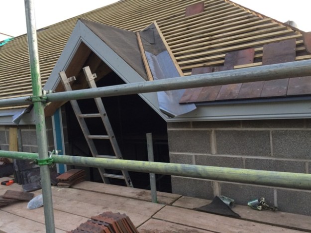 felt-on-new-hip-roof-and-lead-valley-on-right