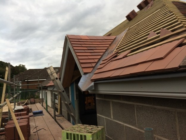 hip-roof-tiled-and-lead-in-valley