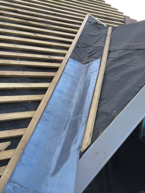 lead-valley-on-lefthand-side-of-hip-roof