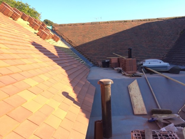 new-kitchen-roof-sloping-onto-flat-roof-area