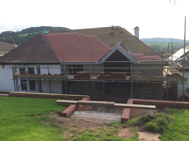 progress-of-tiling-over-kitchen-roof