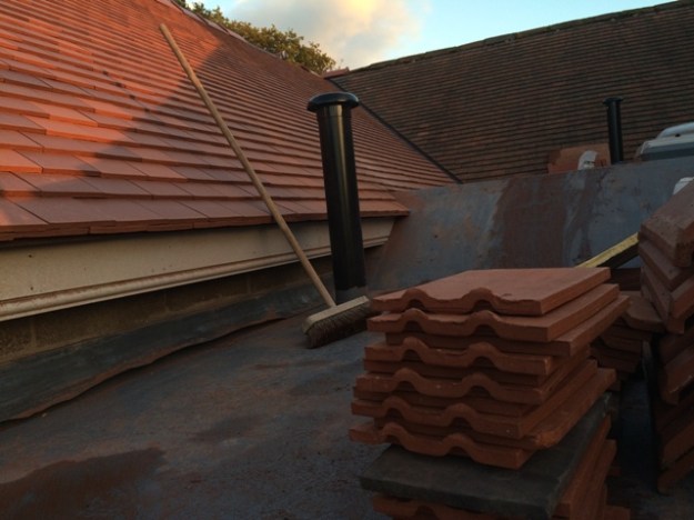 roof-between-old-and-new-building-from-step-ladder