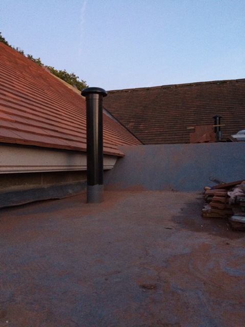 roof-sloping-down-to-flat-roof-nearly-complete