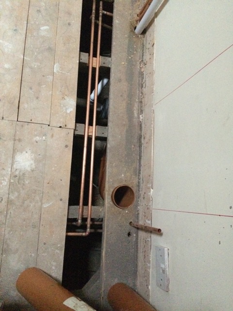 under-the-new-bathroom-floor-where-toilet-and-sink-will-go