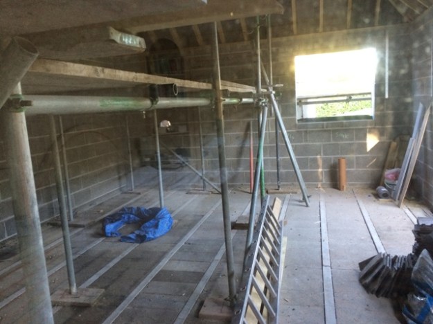 view-through-window-from-main-bedroom-to-new-kitchen-marked-for-sik-dishwasher-cooker