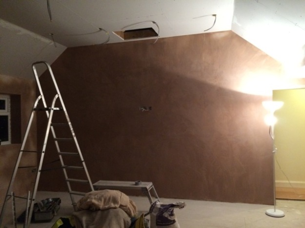 large-wall-adjacent-to-main-bedroom-now-plastered