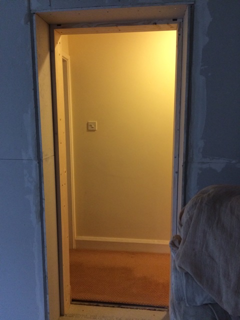new-doorway-into-hall-plasterboarded-ready-for-plasterer