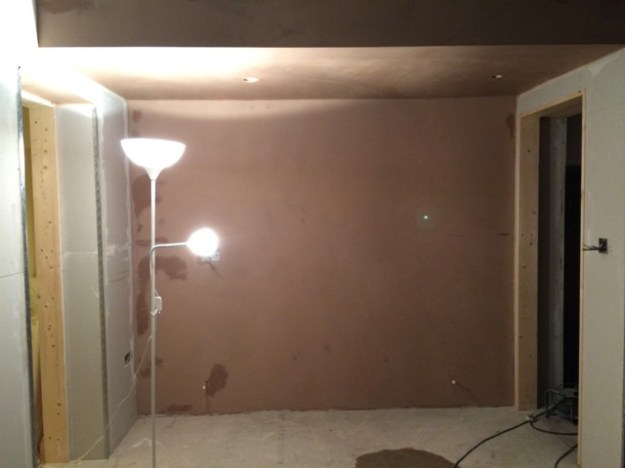 plastering-along-back-wall-of-kitchen-adjacent-to-2-doorways
