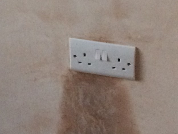 plug-sockets-wired-up-in-small-bedroom-after-plastering