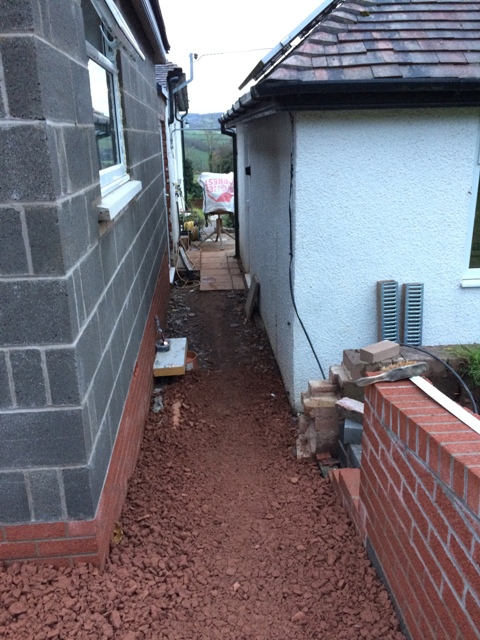 walkway-between-garage-and-new-kitchen-stones-laid-to-form-a-ramp