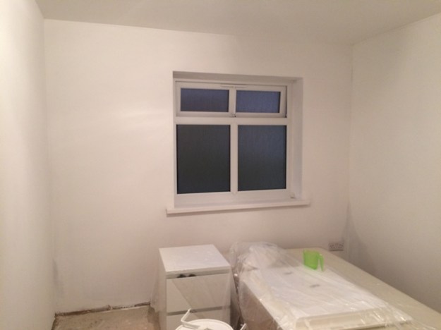 new-small-bedroom-with-first-coat-of-paint