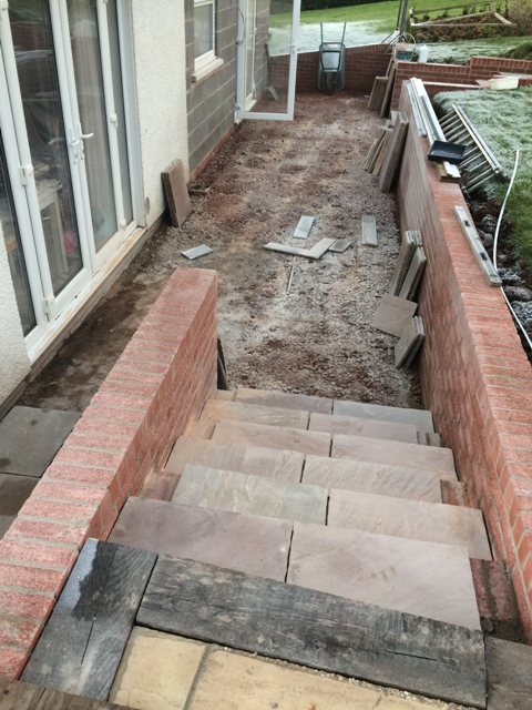 view-from-main-patio-along-back-of-house-slabs-cut-ready-for-laying