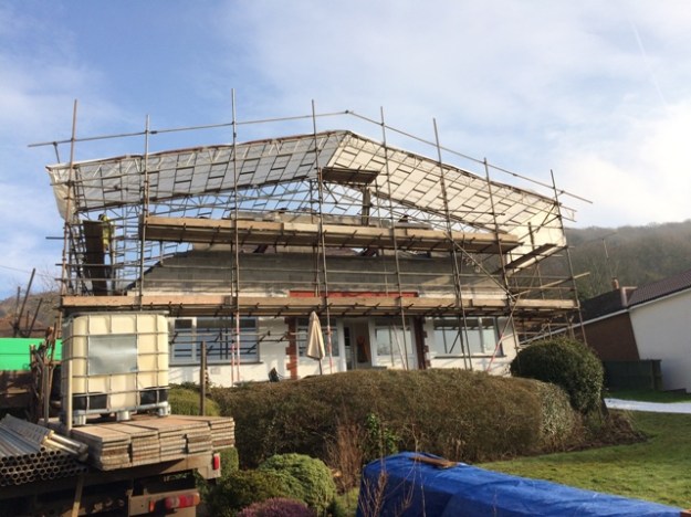 canopy-beginning-to-go-over-house