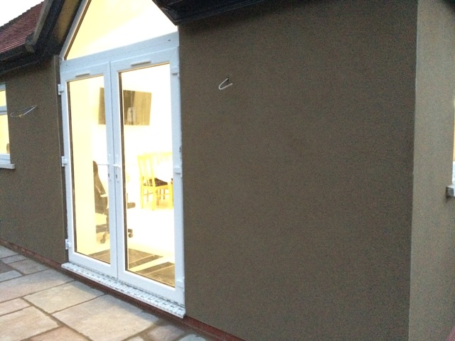 roughcast-outside-patio-doors-of-kitchen