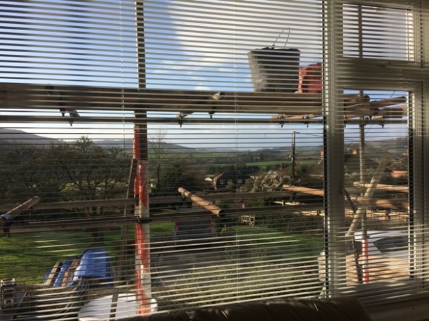 scaffolding-through-the-blinds-in-sitting-room