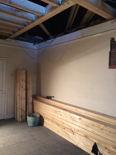 wood-being-stored-inside-bad-weather-forecast-gap-for-staircase-at-top-of-picture