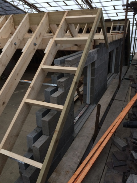 gable-end-structure-on-the-left-side-of-house-under-construction