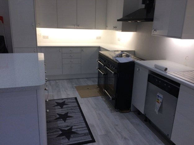 new-under-cupboard-unit-lighting-in-new-kitchen-cooker-hob-still-to-be-connected-to-the-gas