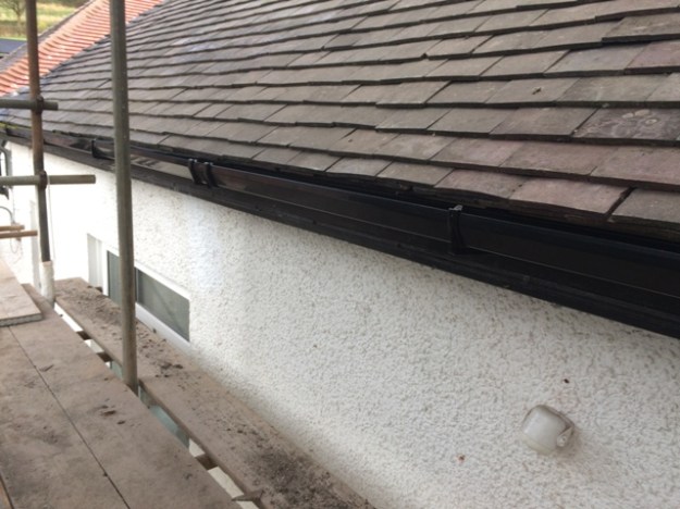 new guttering all along sides of Springdale