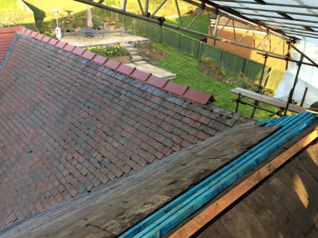 new ridge tiles from new kitchen extension and back bedroom to the very original old part of the house