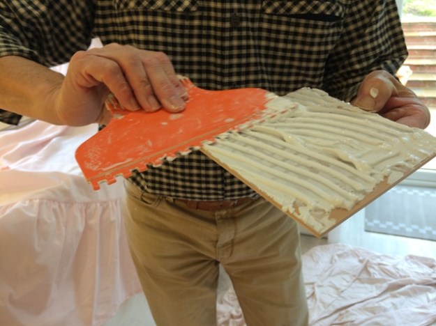 This is what is called 'Buttering of tiles'